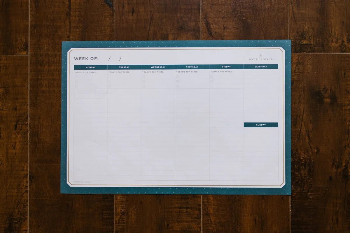 Blank weekly planner used as a reference for spacing treatment sessions